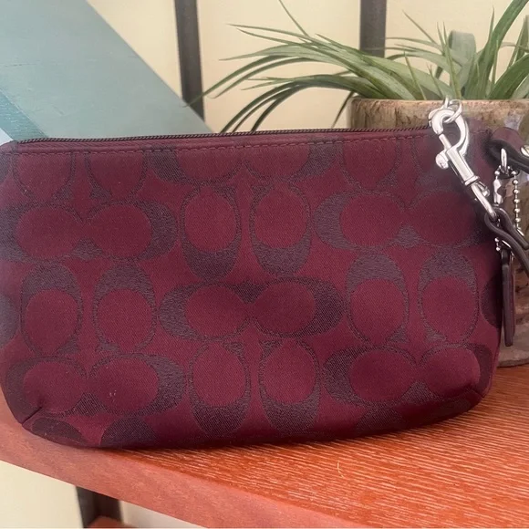 Coach Signature Merlot Wristlet - Picture 4 of 8